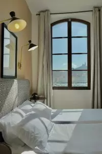 a room in the cozy ecological hotel Belle-vue on the old port of Marseille France