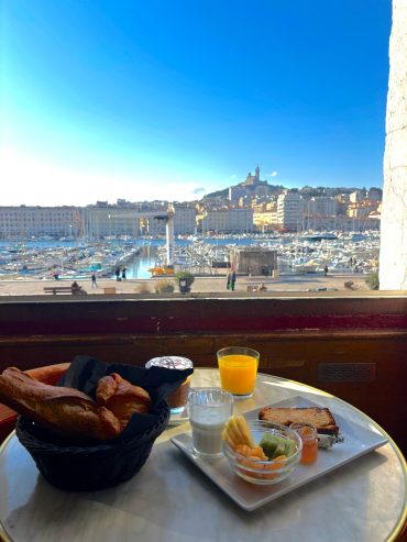Breakfast at the Caravelle at the Belle Vue Marseille Vieux-Port Hotel - Eco-friendly hotel Belle-Vue old port Marseille Dear customers and future visitors, we are pleased to announce that the Hotel Bellevue (and its restaurant La Caravelle) are expanding their breakfast offering: now, in addition to our classic option, you can enjoy a savory version to start your day with taste and comfort. Whether you are on a business trip, a getaway or visiting Marseille, our new breakfast caters to all your cravings — sweet or savory. Why this new savory breakfast option? Traditionally, breakfast at La Caravelle offered a continental menu: fruit juice, hot drink, pastries, breads, jams, cottage cheese, seasonal fruits, homemade sweet or savory cake. But many of our customers find that a more substantial breakfast — especially one that includes savory items — is a better way to start the day. We have therefore decided to expand our offering to provide more choice and comfort. This adaptation is part of our ongoing commitment to improving the customer experience, meeting the diverse expectations of our visitors, and making each stay a pleasant and personalized experience. What the new savory formula includes Thanks to this new breakfast offer, you can now create a more substantial morning meal, with: Pastries & breads, butter/jam sandwiches. Drinks: fruit juice, coffee, tea, hot chocolate, etc. An assortment of savory dishes on request: scrambled or fried eggs, cold cuts, fresh cheeses, possibly homemade recipes — for a more balanced and energizing breakfast. Options to personalize your breakfast according to your tastes and needs (flexibility, convenience, appetite…). Thanks to these additions, the new savory formula allows everyone — early riser, busy traveler, salt lover or simply gourmand — to start the day in the best possible way. Who is this new formula aimed at? For business travelers who need a full breakfast before their busy day. For tourists or visitors passing through who want a more substantial meal before heading out to explore Marseille. For those who prefer savory to sweet in the morning: eggs, cold cuts, cheese, rather than pastries or jams. For active people looking for a balanced and generous breakfast. In short — to all the guests of the Hotel Bellevue / La Caravelle! Added comfort for your stay in Marseille By enriching our breakfast offering, the Hotel Bellevue / La Caravelle wishes to enhance the comfort and satisfaction of its guests. The goal is simple: for you to feel at home from the moment you wake up. Whether you arrive early or late, whether you fancy a simple coffee or a full meal, our team is ready to listen and adapt the service to your needs. This savory option is in keeping with the spirit of conviviality and hospitality for which our establishment is renowned.We are delighted to offer you this new savory breakfast option — a great way to start the day in Marseille, whether gently or indulgently. To take advantage of this, it's simple: book your room or your table, and let us know that you would like the savory version at breakfast. We look forward to welcoming you soon to the Hotel Bellevue / La Caravelle — and introducing you to this new morning experience. See you soon! Eco-friendly hotelBelle-Vue